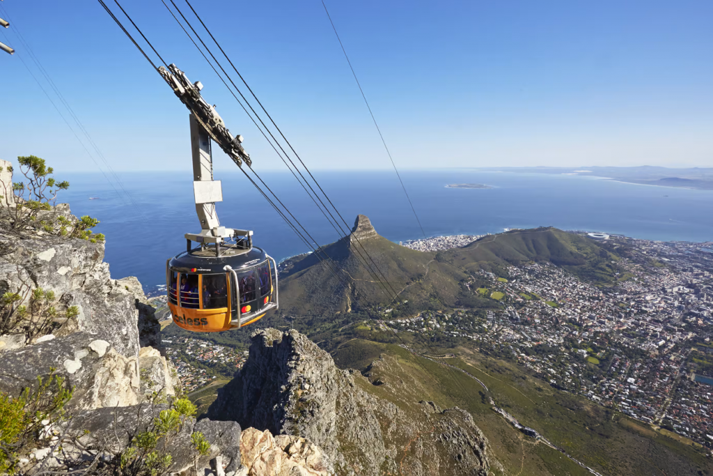 A cable car moving up Table Mountain in Cape Town.